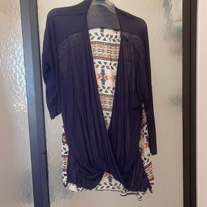 Eyeshadow brand shrug top with patterned back